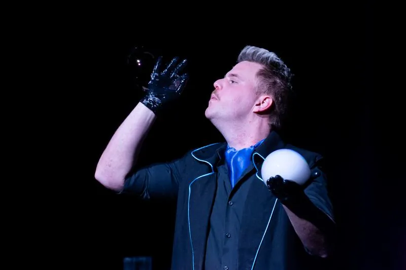 Two bubbles in gloved hands